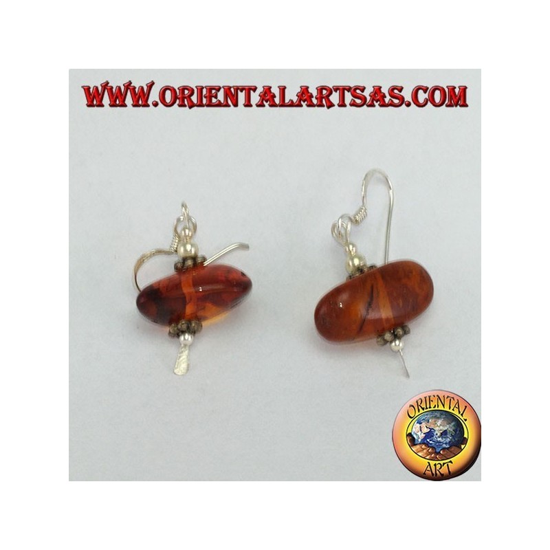 Silver earring with a piece of amber