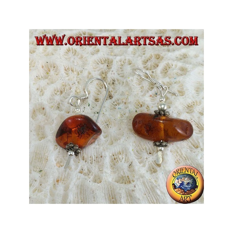 Silver earring with a piece of amber