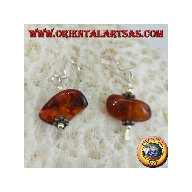 Silver earring with a piece of amber