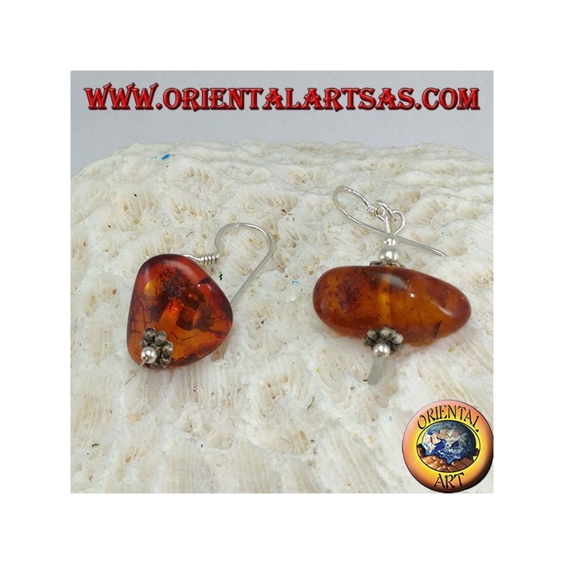 Silver earring with a piece of amber