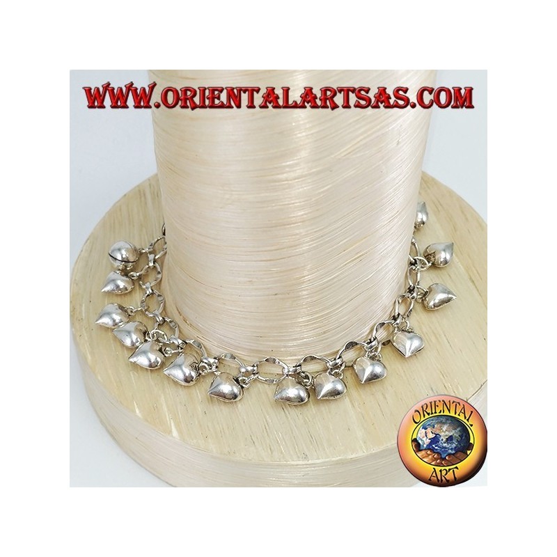 Pulsera de plata con corazones colgantes y campana