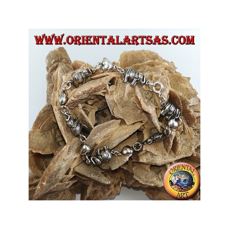 Pulsera de elefantes y corazones que se alternan en una fila en plata