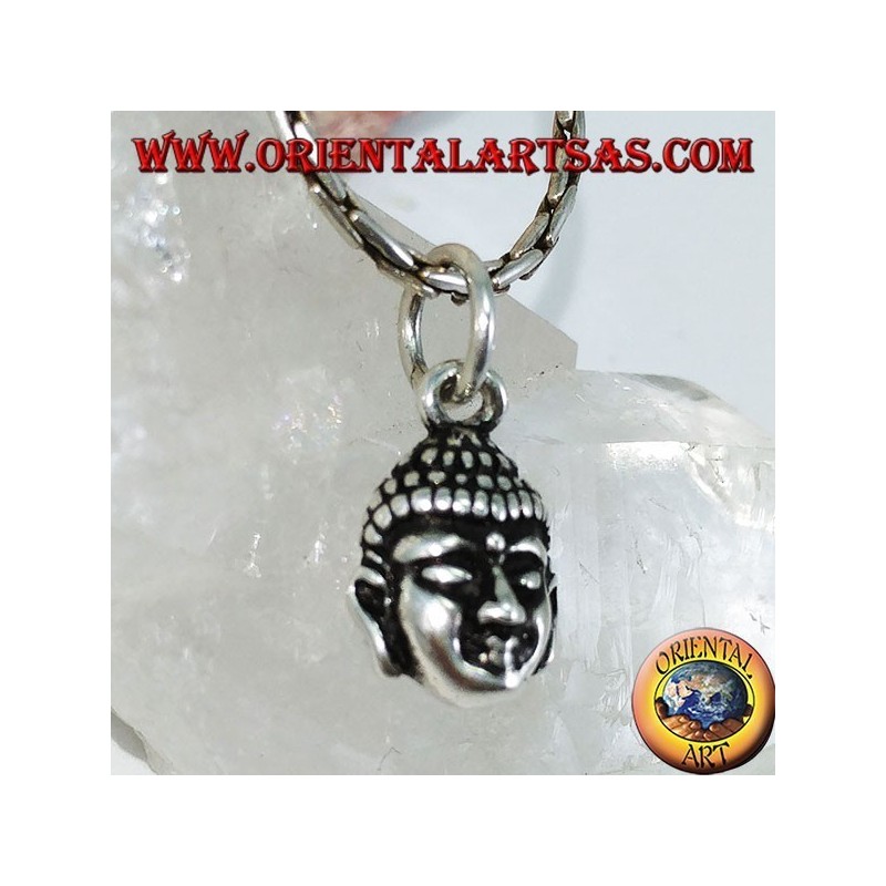 Silver pendant of a small Buddha head