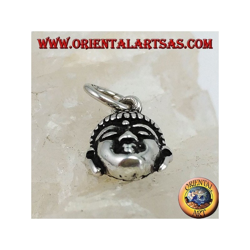 Silver pendant of a small Buddha head