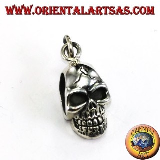 Pendentif en argent, crâne aux tempes percées
