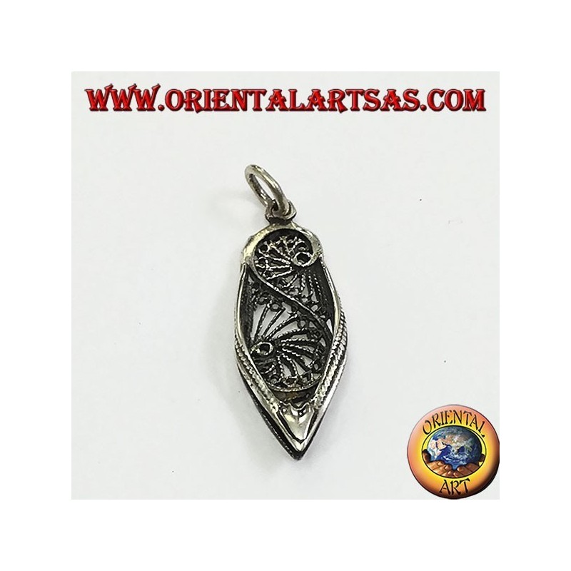 Silver pendant of a typical Indian shoe