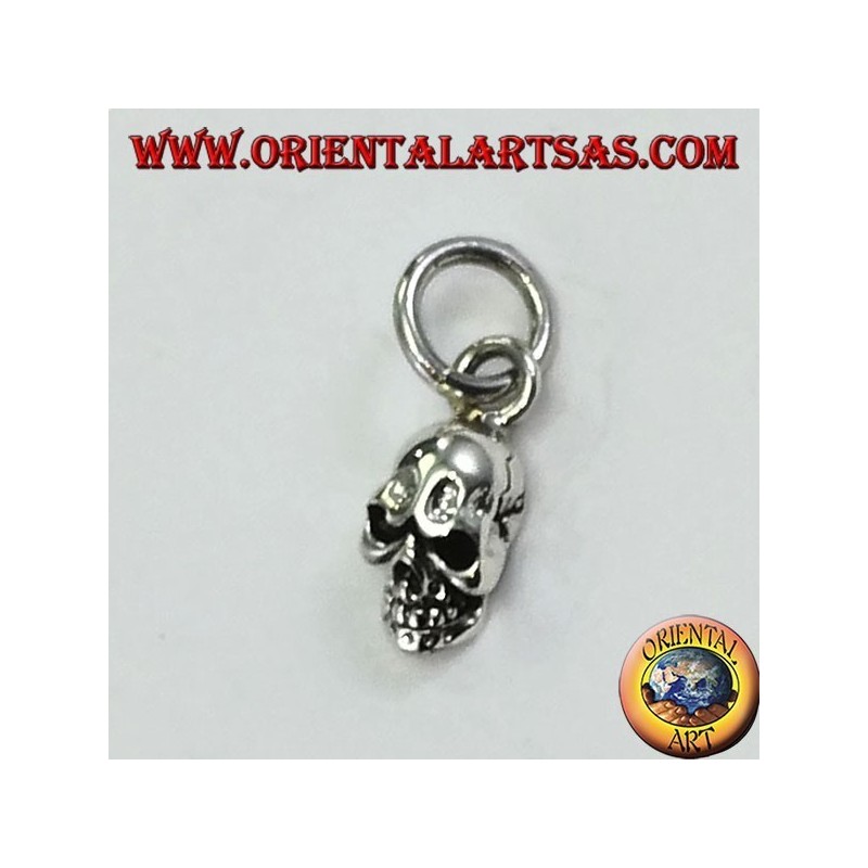 Pendentif en argent, le crâne du dur