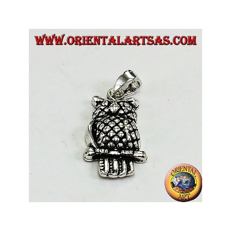 Silver eagle owl pendant on the branch