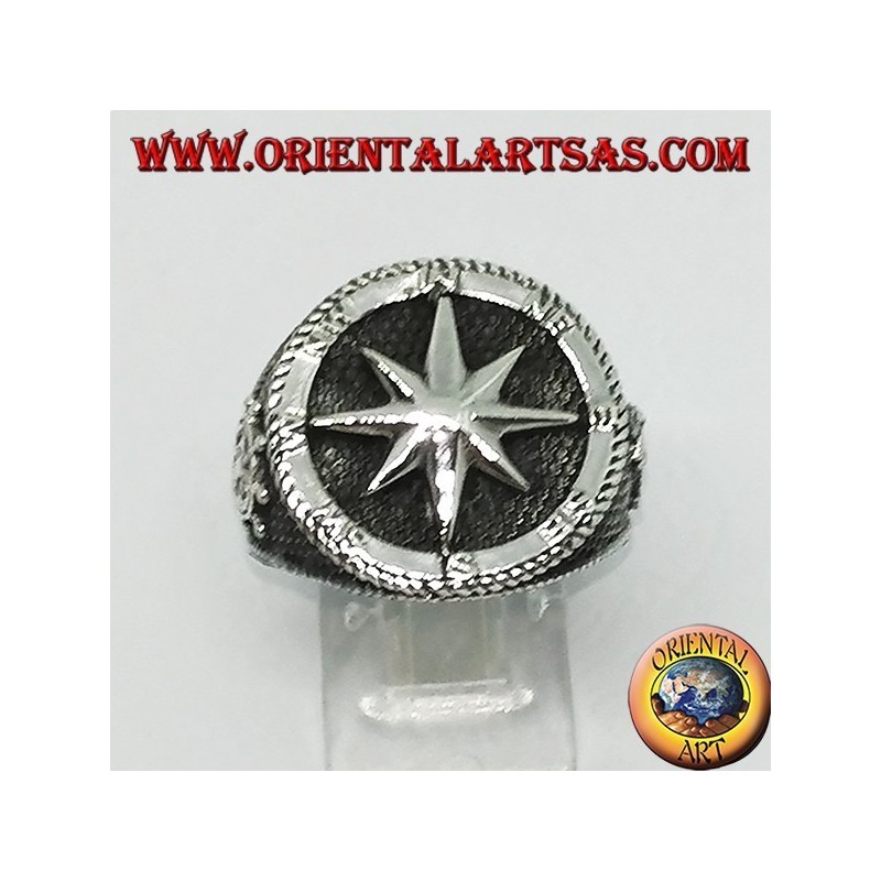 Silver ring with Compass rose, rudder and still on the sides