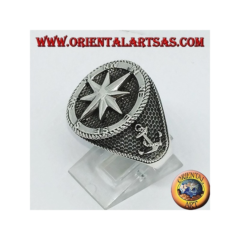 Silver ring with Compass rose, rudder and still on the sides