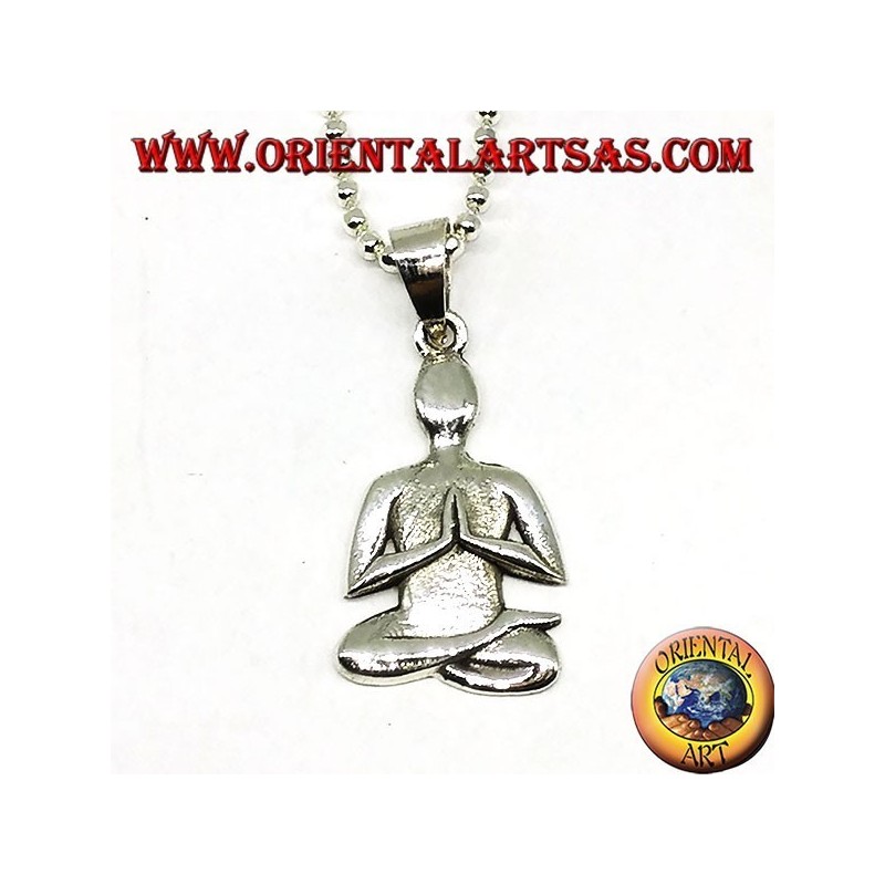 Silver pendant meditation in Sukhasana posture