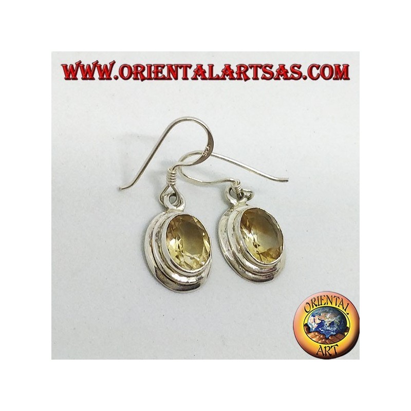 Silver earrings with faceted oval natural Topaz