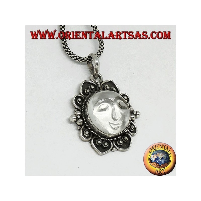 Silver pendant with sun engraved on rock crystal and decorated border