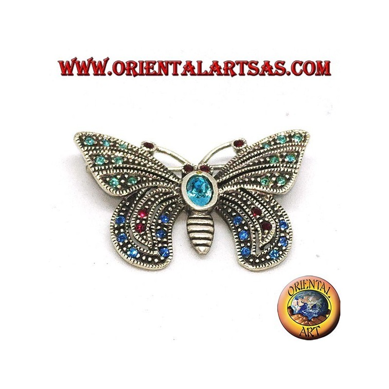Broche de plata con piedras semipreciosas surtidas en forma de mariposa.