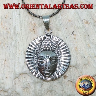 Silver pendant head of a radiant Buddha
