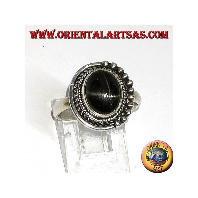 Silver ring with black oval set inlaid