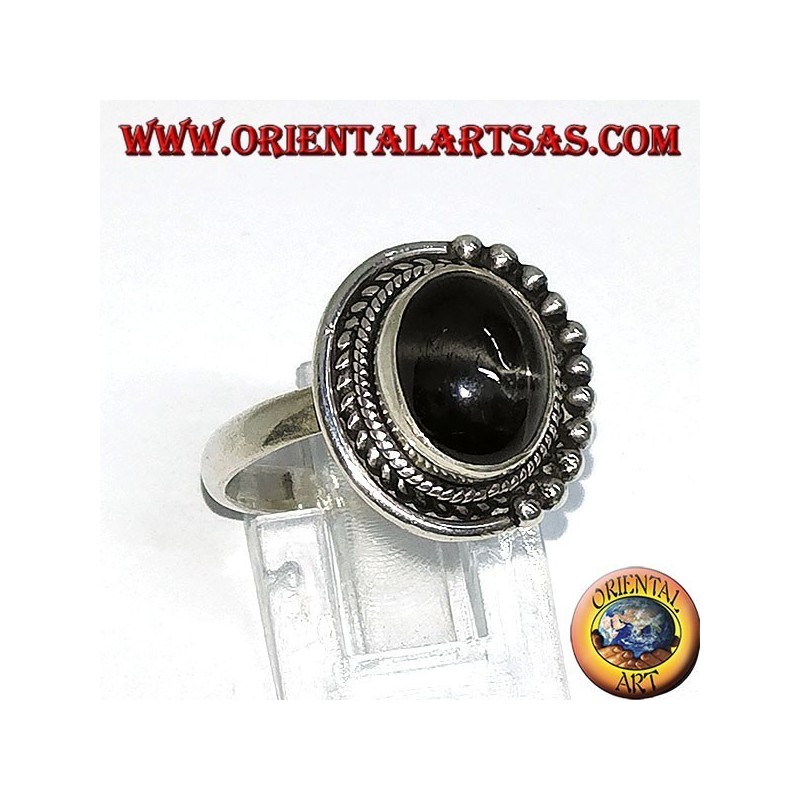 Silver ring with black oval set inlaid