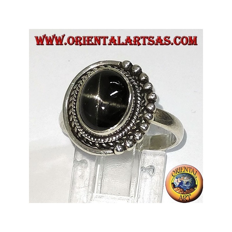 Silver ring with black oval set inlaid