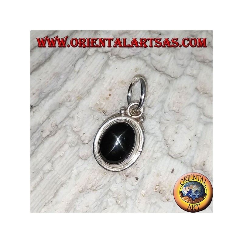 Silver pendant with black star (Diopside) oval and smooth edge