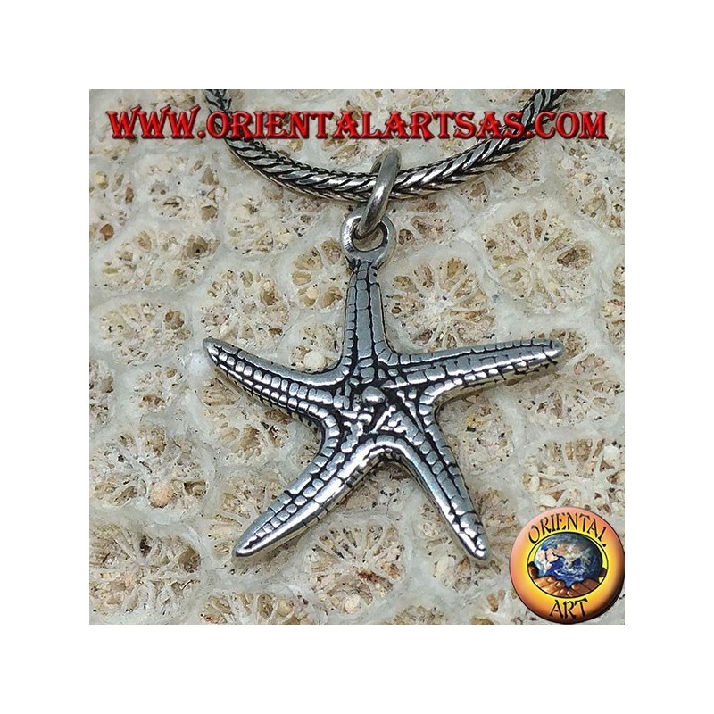 Silver pendant in the shape of a double-sided starfish