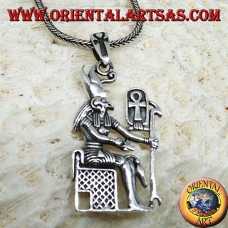 Silver pendant of the god Horus sitting on the throne
