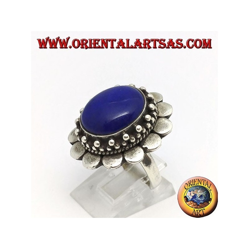 Silver ring with oval lapis lazuli surrounded by round plates