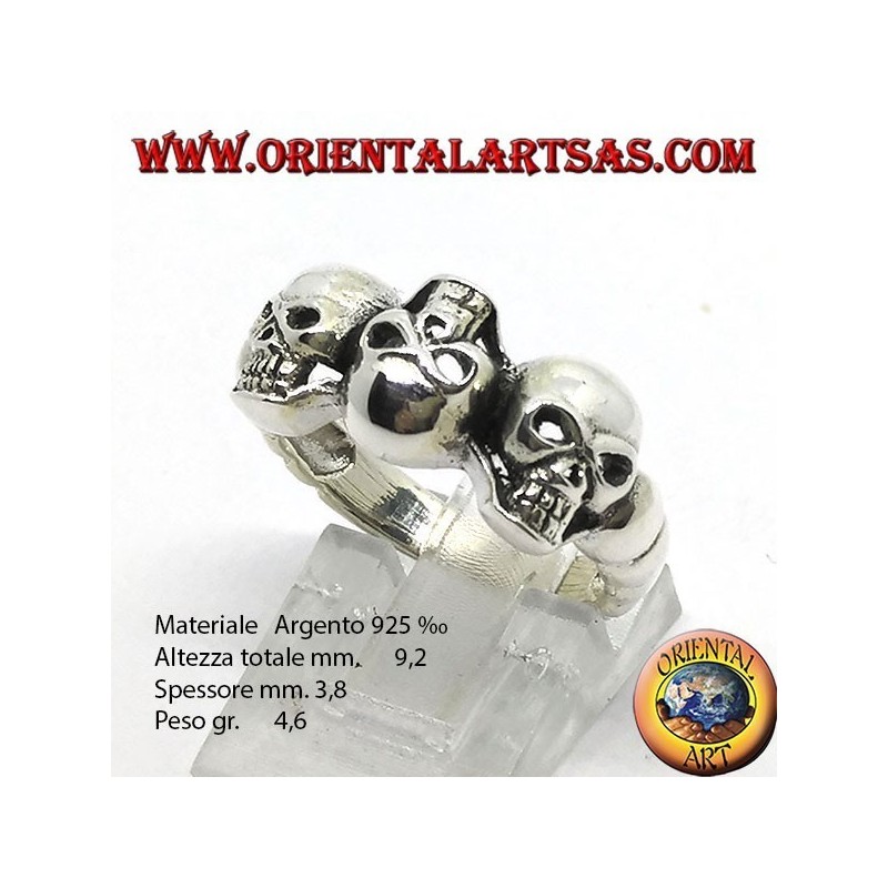 Silver skull ring with garnet eyes