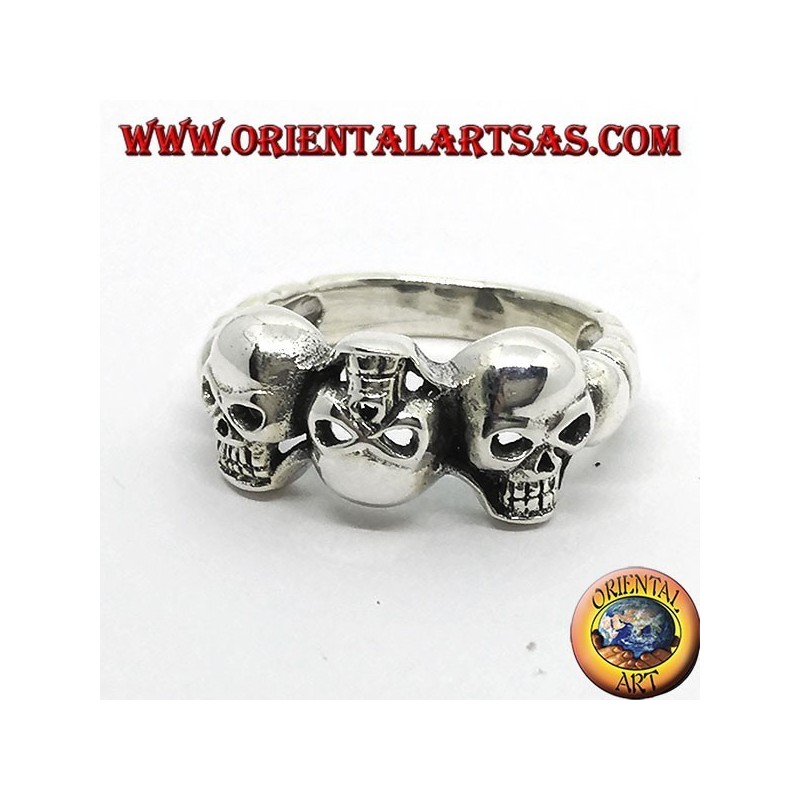 Silver skull ring with garnet eyes