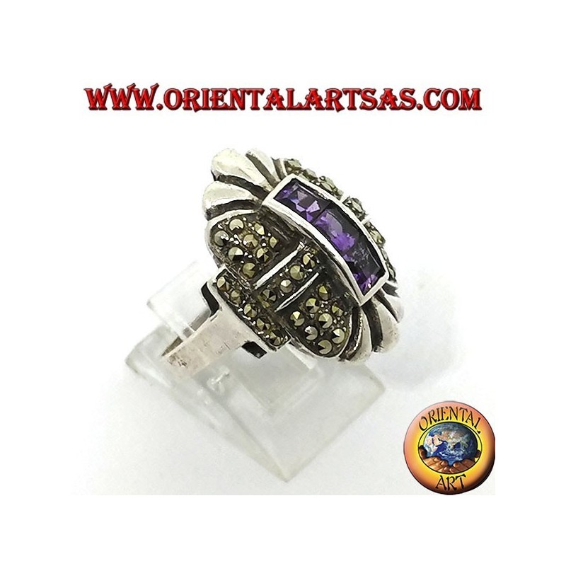 Silver ring with marcasite and three square amethysts in a row in the center