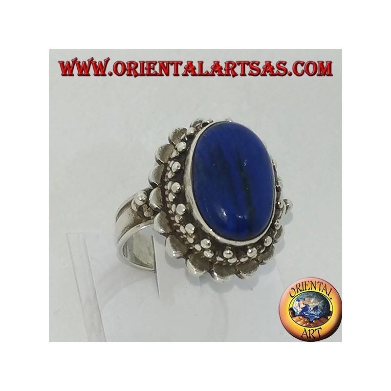 Silver ring with large oval lapis lazuli surrounded by balls
