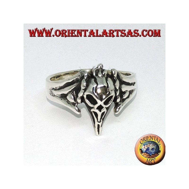 Bague en argent avec le crâne du corbeau
