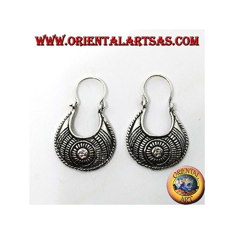 Carved silver earrings with a carved bag of ethnic style