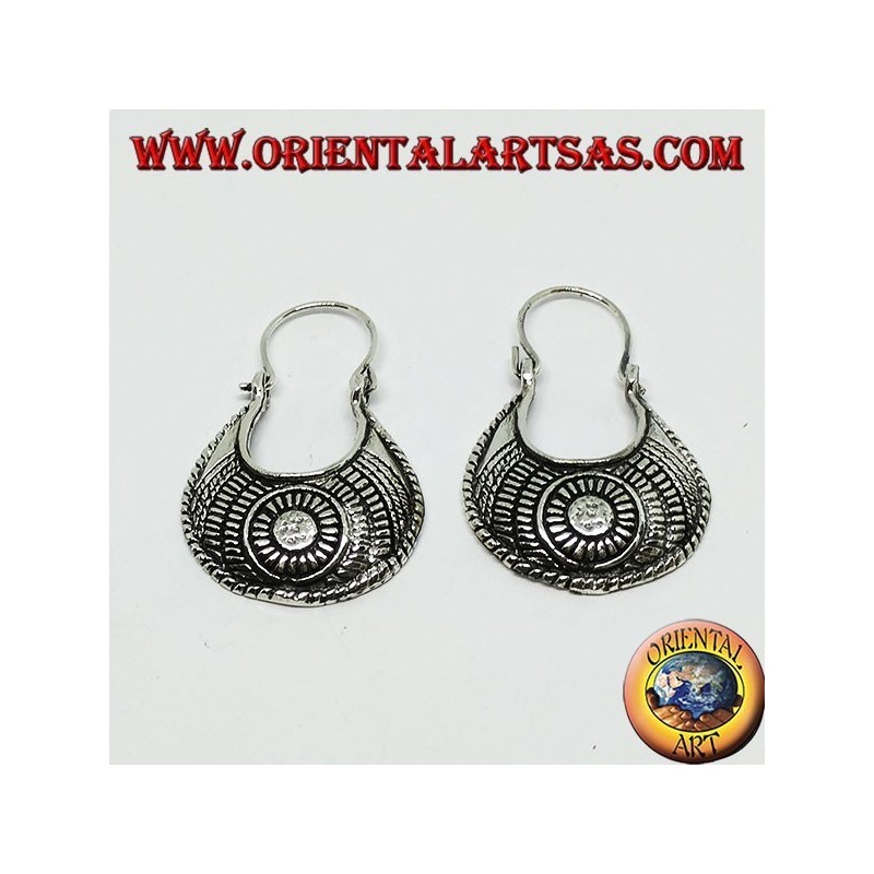Carved silver earrings with a carved bag of ethnic style