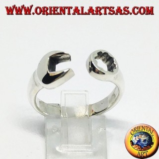 Silver ring in the shape of a ring key and fork combined with a mechanic