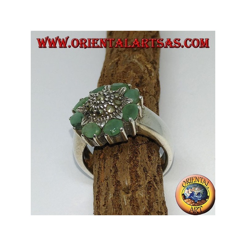 Silver ring with central flower and marcasites surrounded by 8 natural emeralds