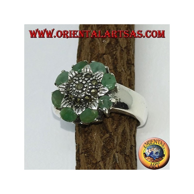Silver ring with central flower and marcasites surrounded by 8 natural emeralds