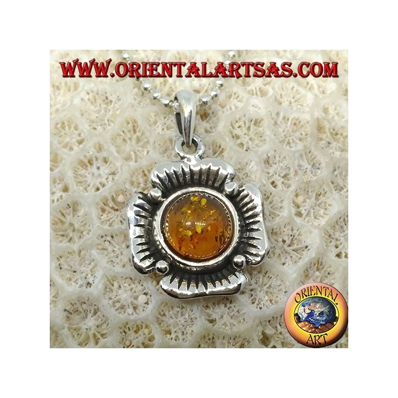 Silver pendant in the shape of a flower with a central hemispherical amber