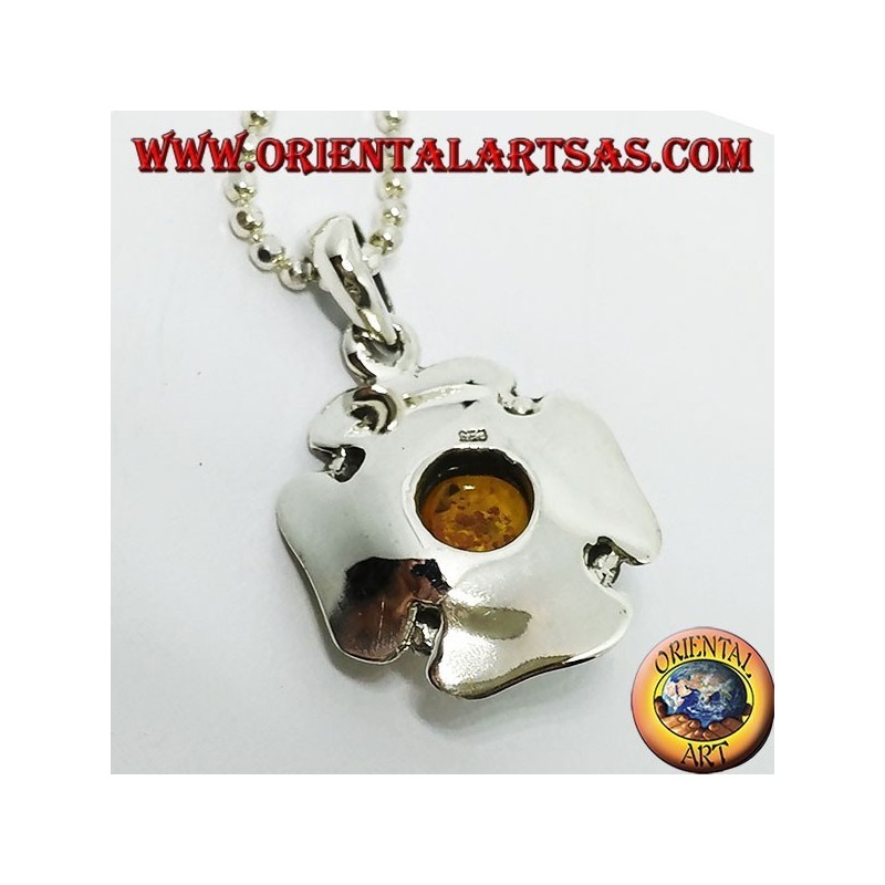 Silver pendant in the shape of a flower with a central hemispherical amber