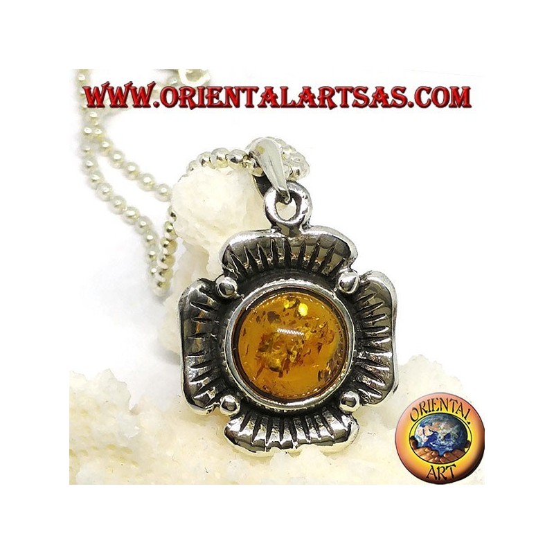 Silver pendant in the shape of a flower with a central hemispherical amber