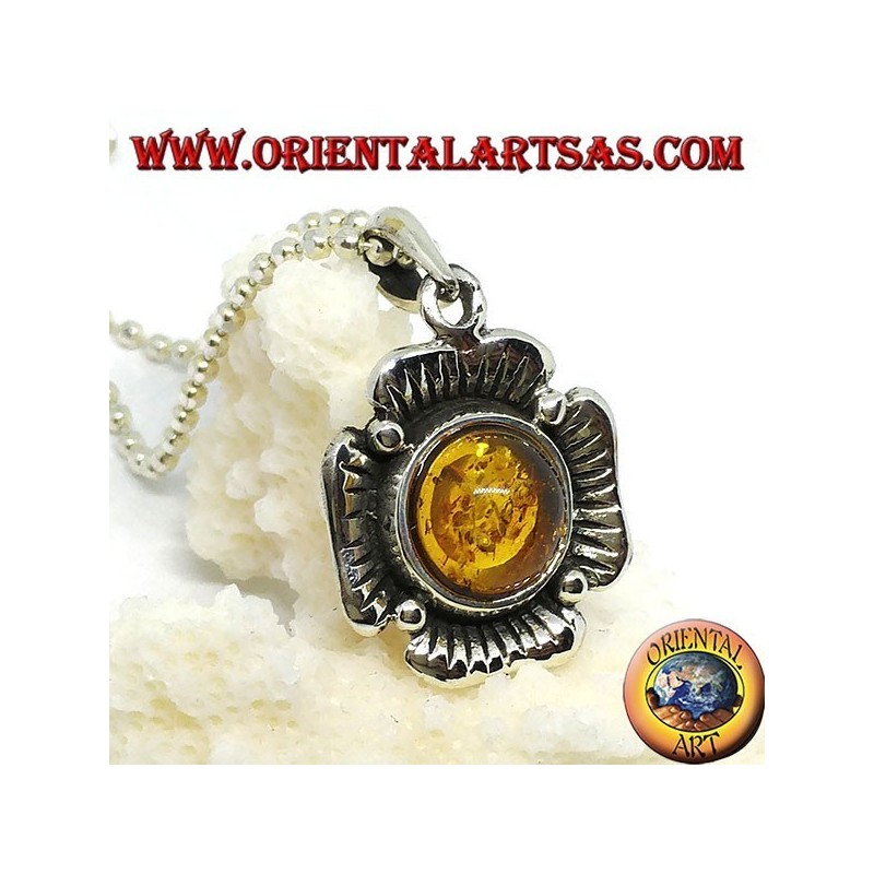 Silver pendant in the shape of a flower with a central hemispherical amber