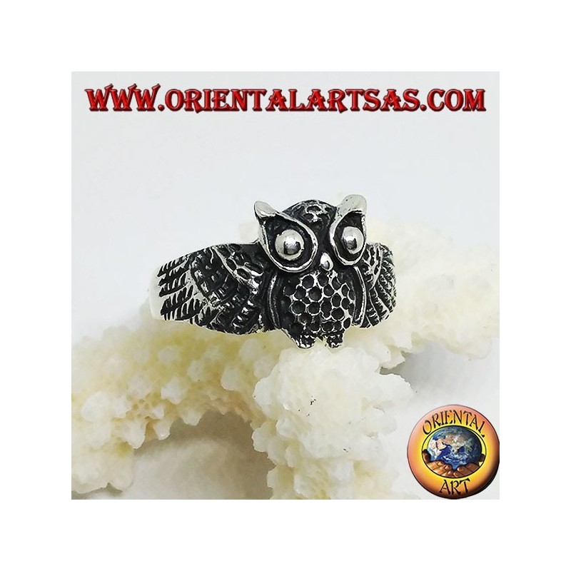Silver ring in the shape of an owl owl