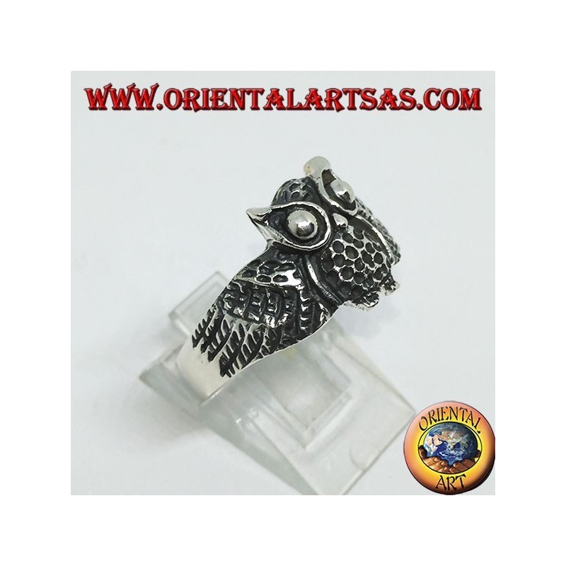 Silver ring in the shape of an owl owl