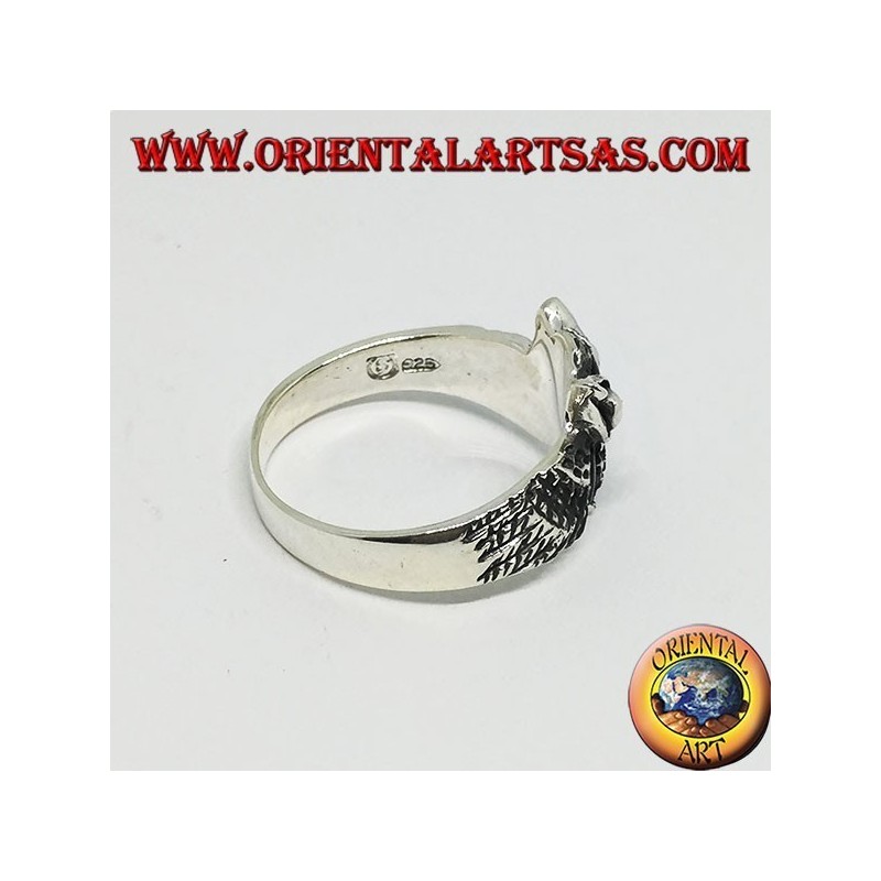 Silver ring in the shape of an owl owl