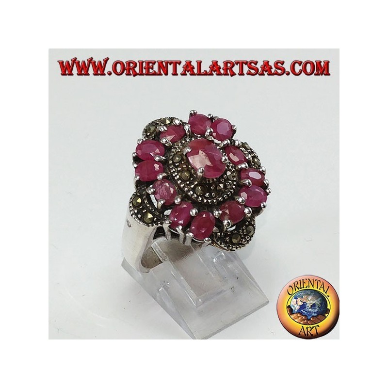 Silver ring with 13 oval rubies set and adorned with marcassite
