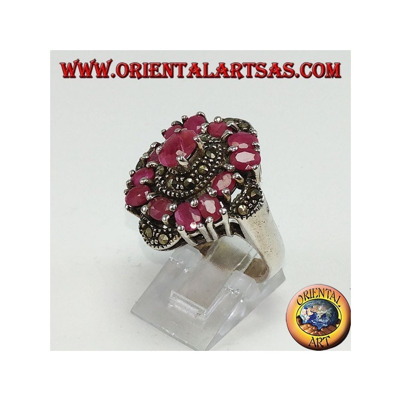 Bague en argent sertie de 13 rubis ovales et ornée de marcassite