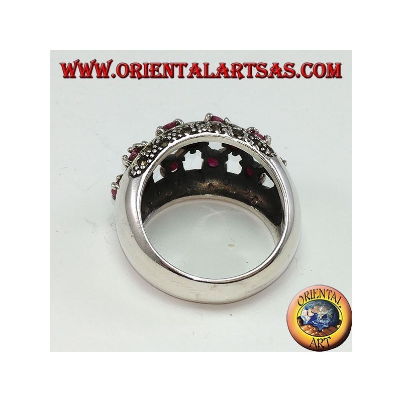 Bague en argent avec bande perforée arrondie avec 13 rubis sertis