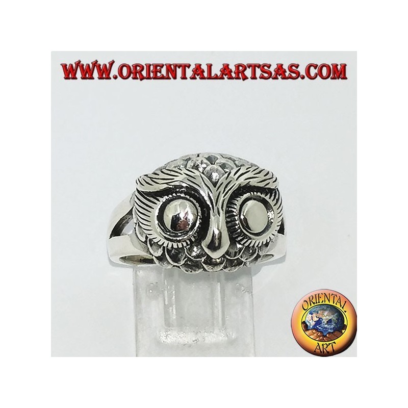 Silver ring with owl's head with big eyes