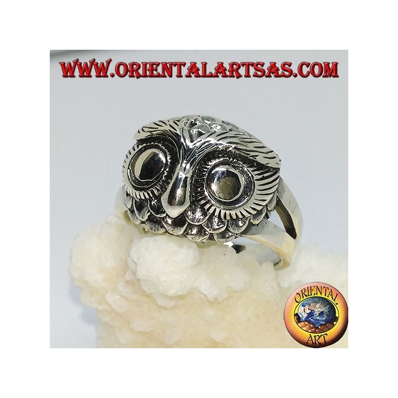Silver ring with owl's head with big eyes