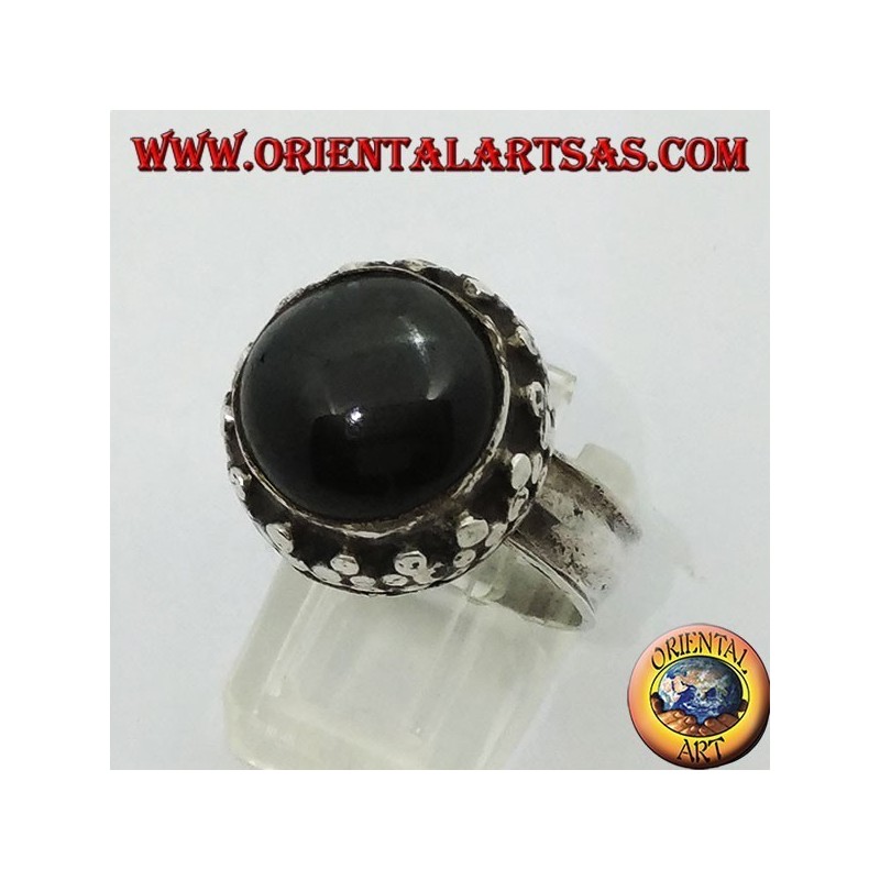 Silver ring on high edge with round Black Star set
