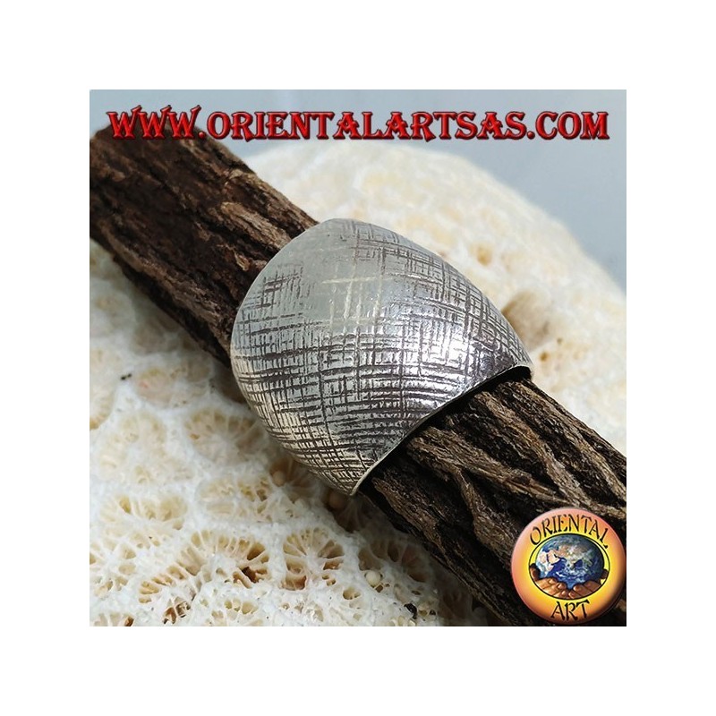 Silver ring with curved band with handmade crossed stripes